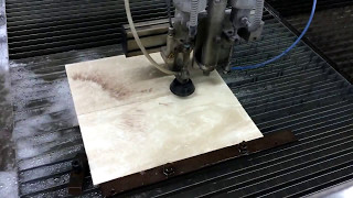 Waterjet Cutting Floor Tiles [upl. by Anaeg854]