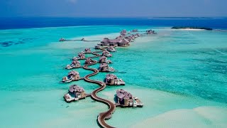 Maldives 4K  Beautiful relaxing music  surreal drone footage [upl. by Potter]