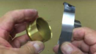 Installing a clock mainspring [upl. by Huoh]