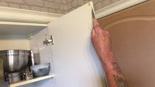 Kitchen Makeover Part 1  Removing the Wrap From Kitchen Cabinets [upl. by Gerger]