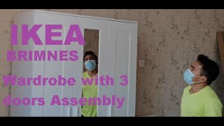 IKEA BRIMNES Wardrobe with 3 doors Assembly [upl. by Anatnom]