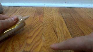 How To Fill In Gaps Between Hardwood Flooring With Wood Filler [upl. by Vanny503]