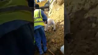 Trench collapse and attempted rescue [upl. by Ecinaj]